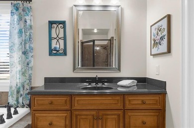 Set within the gated enclave of North Gate Manor, a sought-after - photo 26