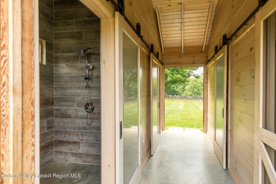 Set on 17 private acres with sweeping views across the Catskill - photo 34