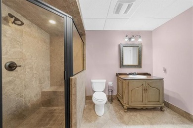 Set within the gated enclave of North Gate Manor, a sought-after - photo 40