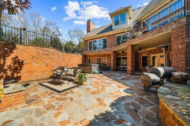Set within the gated enclave of North Gate Manor, a sought-after - photo 45