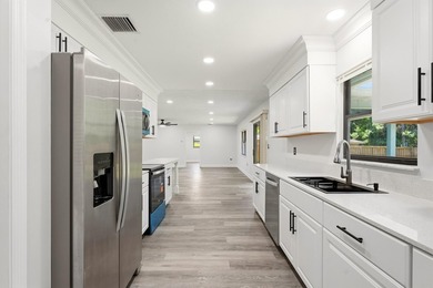 Fully remodeled and move-in ready! This 2-bedroom, 2-bathroom - photo 9