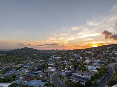 Perched high above the ocean in coveted Waialae Iki, this - photo 21
