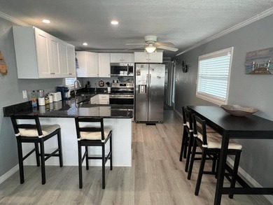 TERRIFIC LOWER PRICE! Experience relaxed Florida living at Four - photo 6