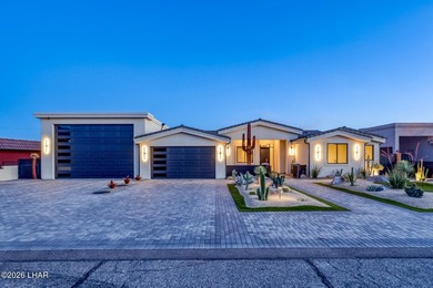 CUSTOM HOME nestled in the Bison foothills with beautiful lake - photo 1