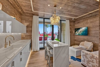 Experience the pinnacle of beachfront luxury with this - photo 11