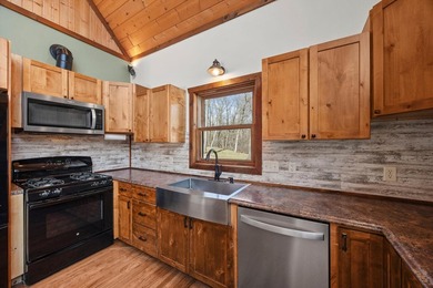 Tucked away on 6.6 wooded acres, this 3-bedroom, 2-bath home - photo 11