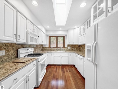 This spacious, end-unit condo in the highly sought-after Port of - photo 12