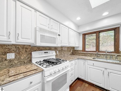 This spacious, end-unit condo in the highly sought-after Port of - photo 15