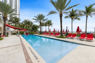 Experience the pinnacle of beachfront luxury with this - photo 16