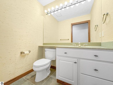 This spacious, end-unit condo in the highly sought-after Port of - photo 16