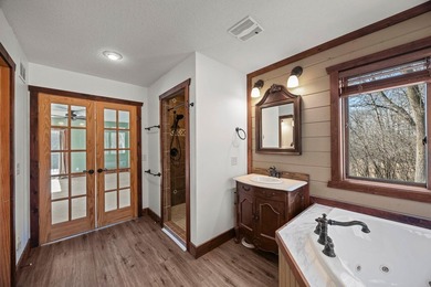 Tucked away on 6.6 wooded acres, this 3-bedroom, 2-bath home - photo 18