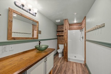 Tucked away on 6.6 wooded acres, this 3-bedroom, 2-bath home - photo 29