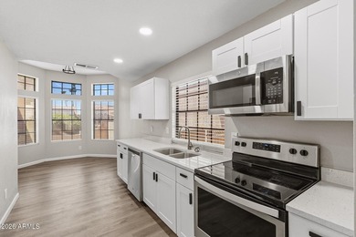 REMODELED, MOVE-IN READY, AND LOCATED IN A LAKE COMMUNITY! This - photo 2