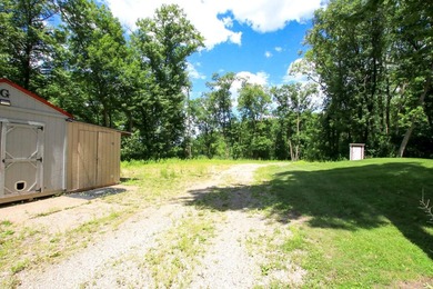 Tucked away on 6.6 wooded acres, this 3-bedroom, 2-bath home - photo 41