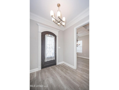 Welcome to 104 Westwind Court in the heart of Ocean Springs! - photo 4