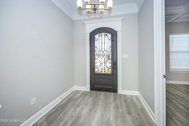 Welcome to 104 Westwind Court in the heart of Ocean Springs! - photo 5