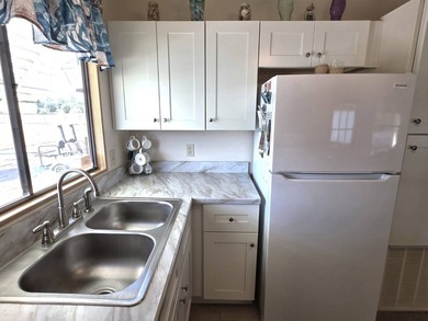 THIS HOME IS ON LEASED LAND WITH A MONTHLY LOT RENT OF $721 AND - photo 22
