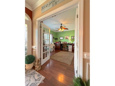 Now available is this stately brick home located in the - photo 5