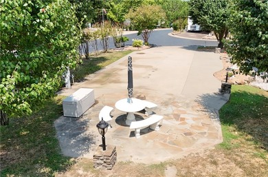 Experience the best of lakeside living in this premium back-in - photo 3