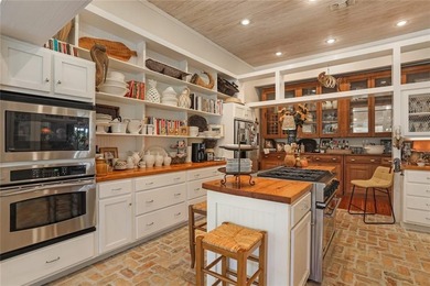 Nestled on a serene pond in Slidell, this one-of-a-kind custom - photo 11