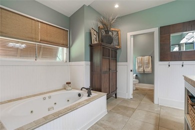 Nestled on a serene pond in Slidell, this one-of-a-kind custom - photo 15