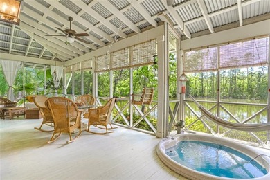 Nestled on a serene pond in Slidell, this one-of-a-kind custom - photo 19