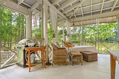 Nestled on a serene pond in Slidell, this one-of-a-kind custom - photo 21