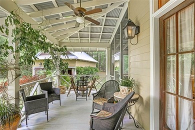 Nestled on a serene pond in Slidell, this one-of-a-kind custom - photo 22