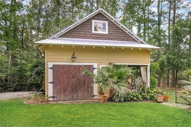 Nestled on a serene pond in Slidell, this one-of-a-kind custom - photo 24
