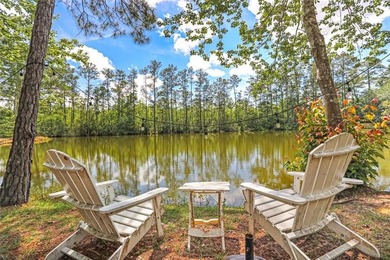 Nestled on a serene pond in Slidell, this one-of-a-kind custom - photo 25