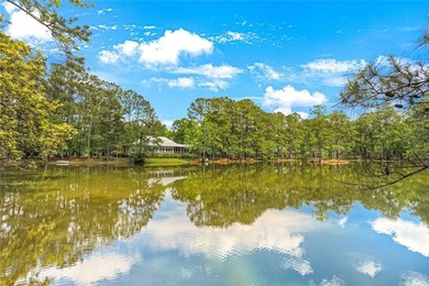 Nestled on a serene pond in Slidell, this one-of-a-kind custom - photo 26