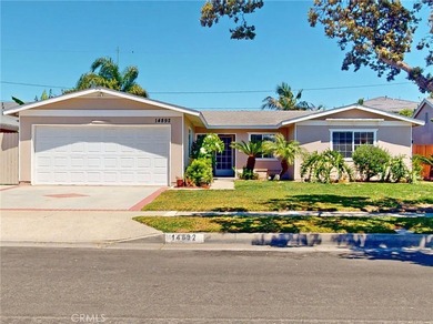 14892 Sunnycrest HB Description This is the home you have been - photo 1