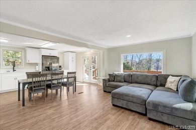 A renovated ranch on the shores of Poplar Creek. Privacy awaits