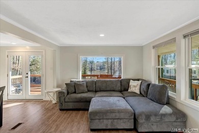 A renovated ranch on the shores of Poplar Creek. Privacy awaits