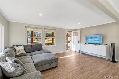 A renovated ranch on the shores of Poplar Creek. Privacy awaits