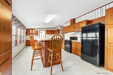 If you enjoy country relaxation, having ample storage, or - photo 6