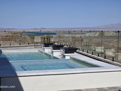 This newly constructed, single-story residence in the exclusive - photo 1