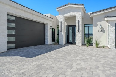 This newly constructed, single-story residence in the exclusive - photo 7