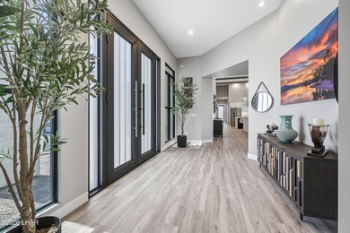 This newly constructed, single-story residence in the exclusive - photo 8