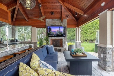 Set behind layers of mature landscaping and sculpted hedges - photo 13