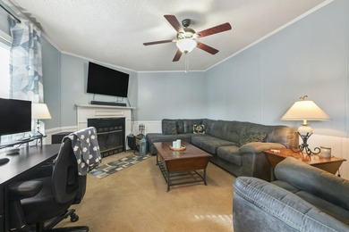 Welcome to 6043 East West Way, an inviting coastal home nestled - photo 12