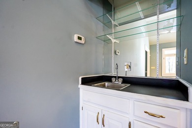 Lakeside Living at Its Finest! This captivating custom-built - photo 16
