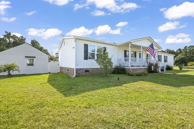 Welcome to 6043 East West Way, an inviting coastal home nestled - photo 22