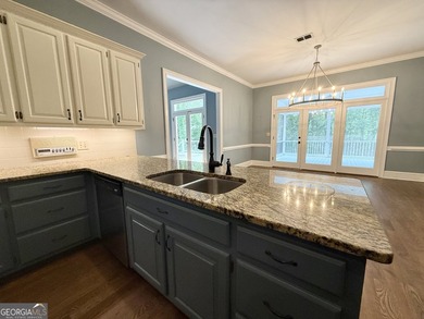 Lakeside Living at Its Finest! This captivating custom-built - photo 23