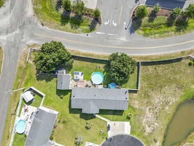 Welcome to 6043 East West Way, an inviting coastal home nestled - photo 30