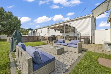 Welcome to 6043 East West Way, an inviting coastal home nestled - photo 31