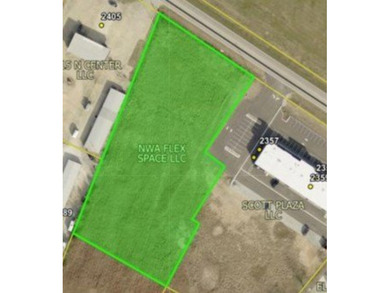 2.69 flat acres with 248' of frontage on Highway 16. The - photo 1