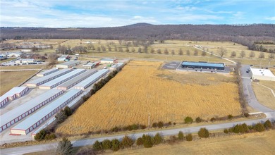 2.69 flat acres with 248' of frontage on Highway 16. The - photo 2