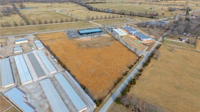2.69 flat acres with 248' of frontage on Highway 16. The - photo 3