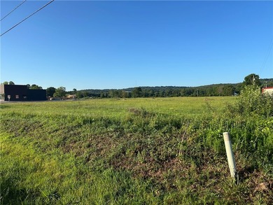 2.69 flat acres with 248' of frontage on Highway 16. The - photo 4